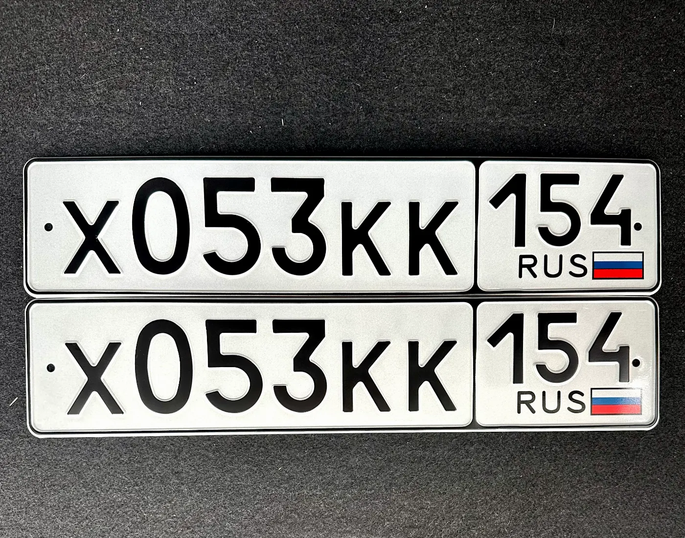 Фото красивого госномера Х053КК 154